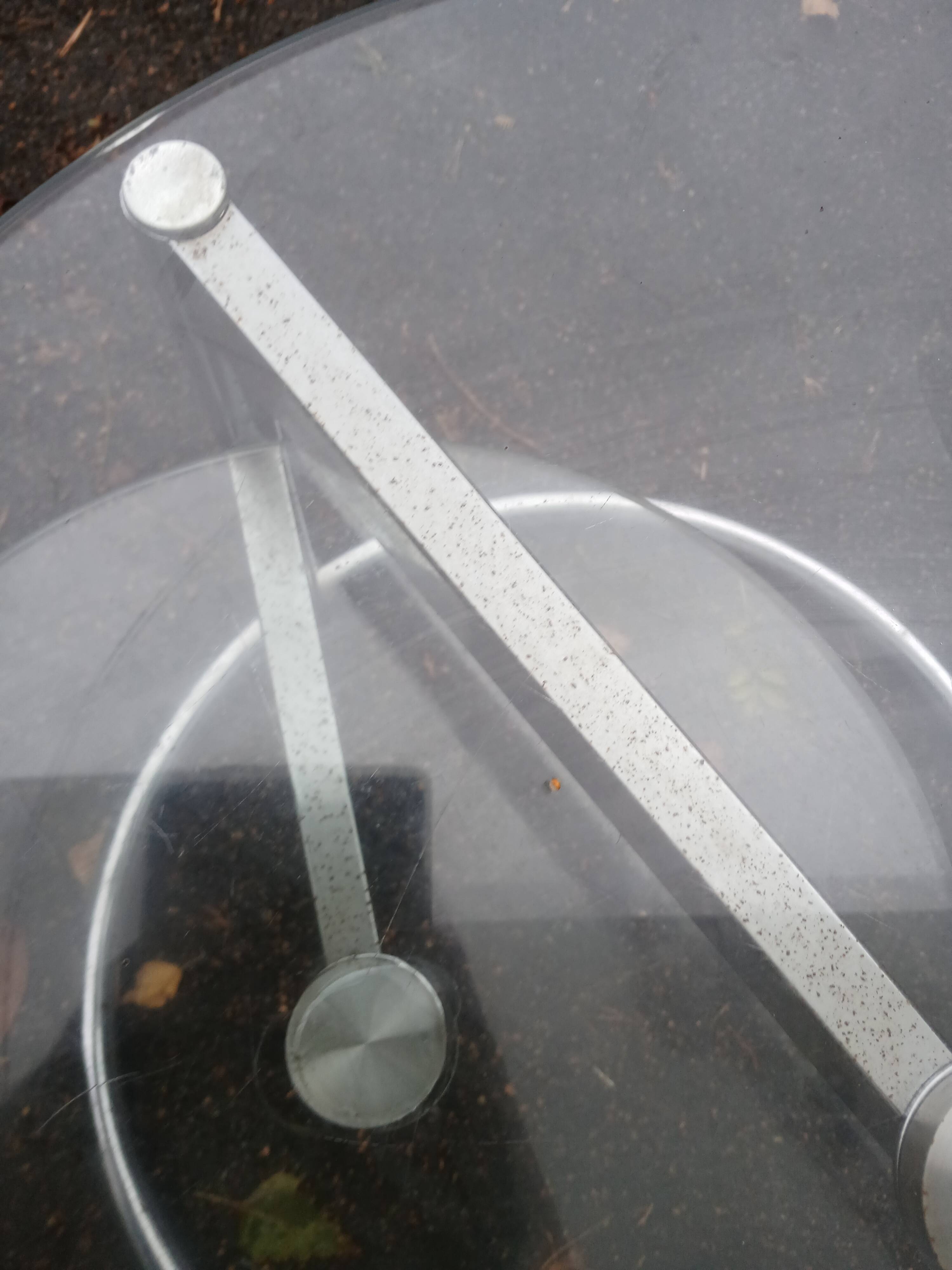 Old chrome metal coffee table with swivel tops from the 70s