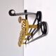 Black and yellow wall coat rack, France
