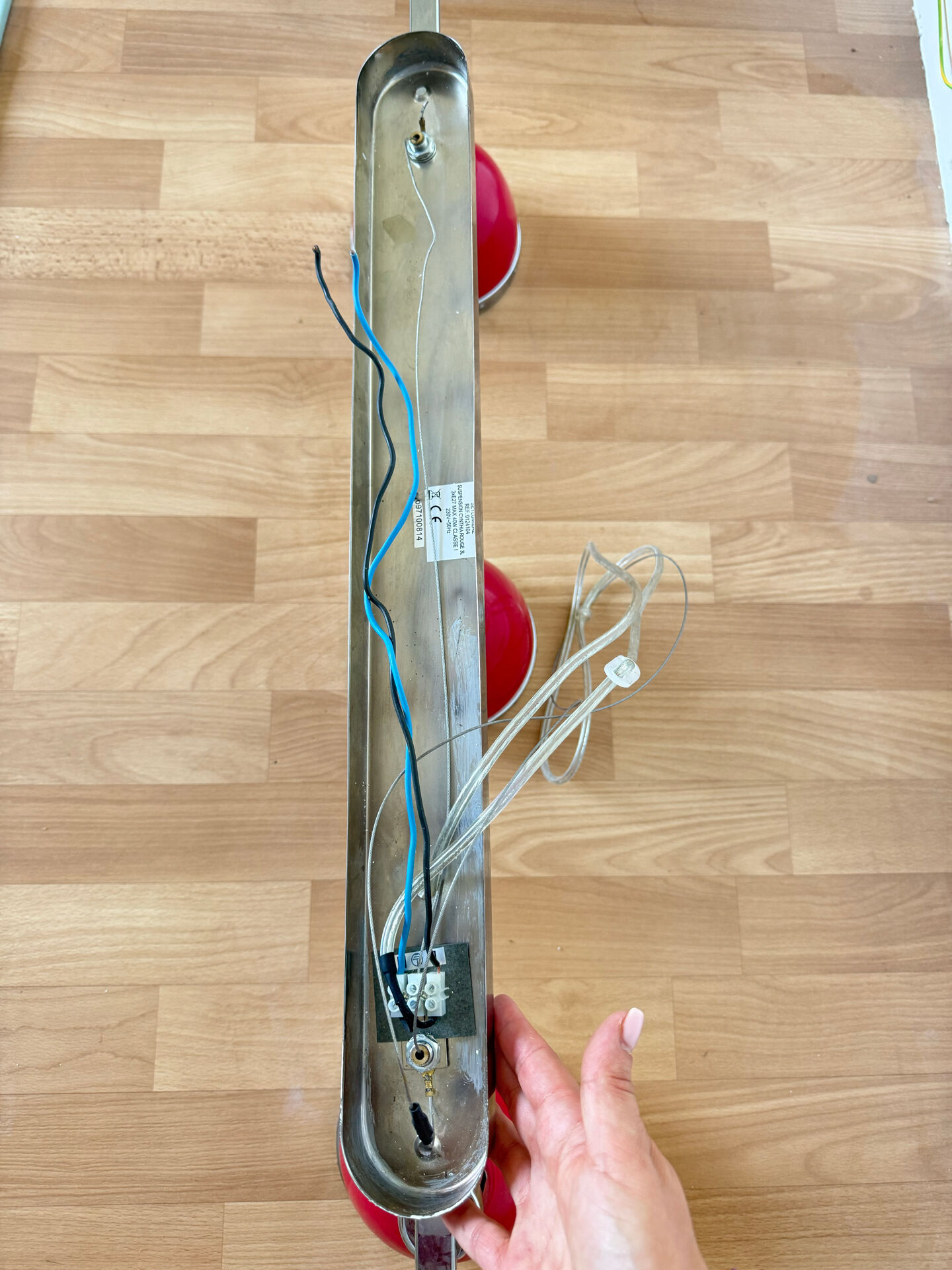 Designer pendant light with 3 red and chrome spots