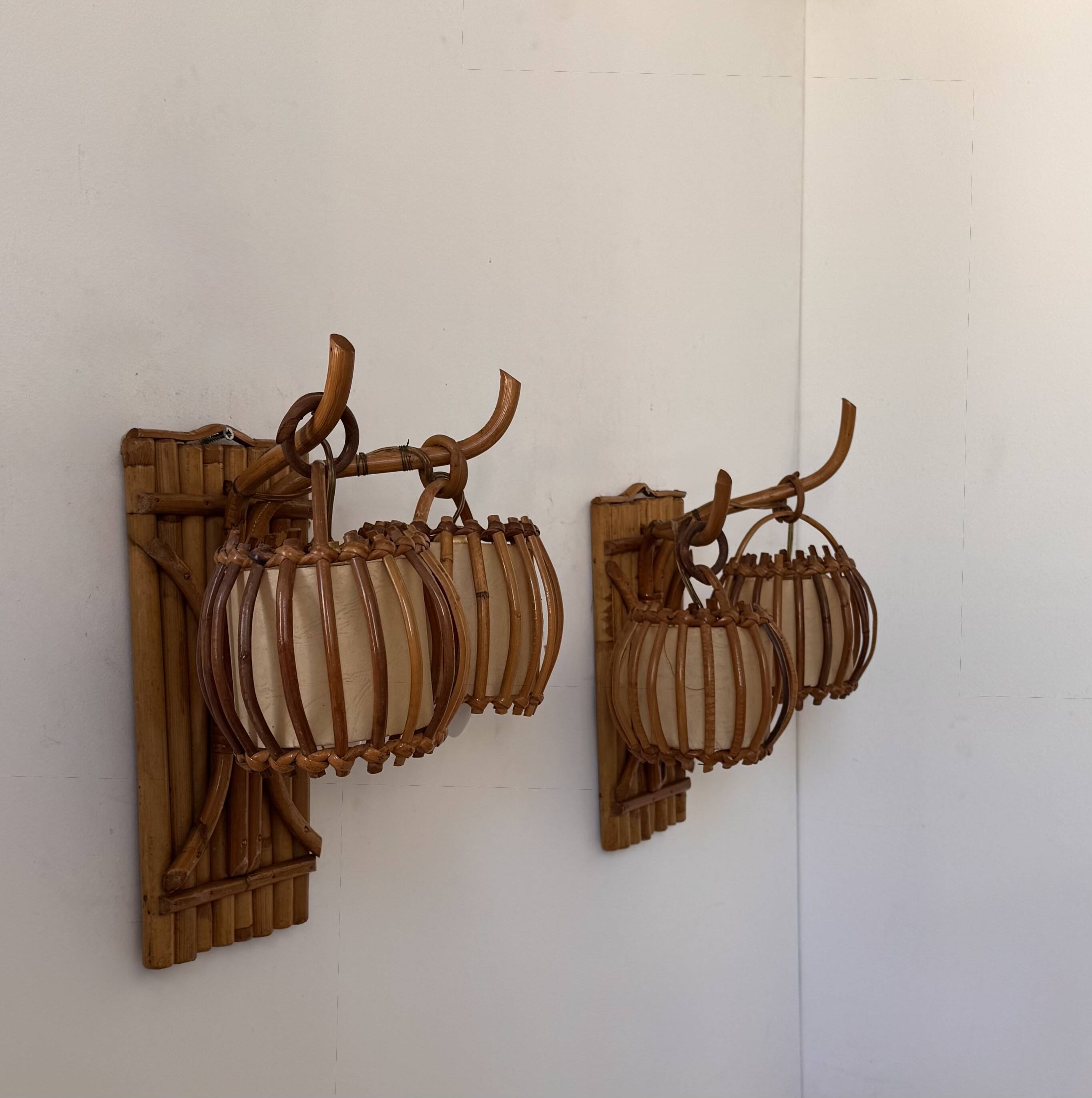 Vintage pair of rattan wall lights, France, 1950.