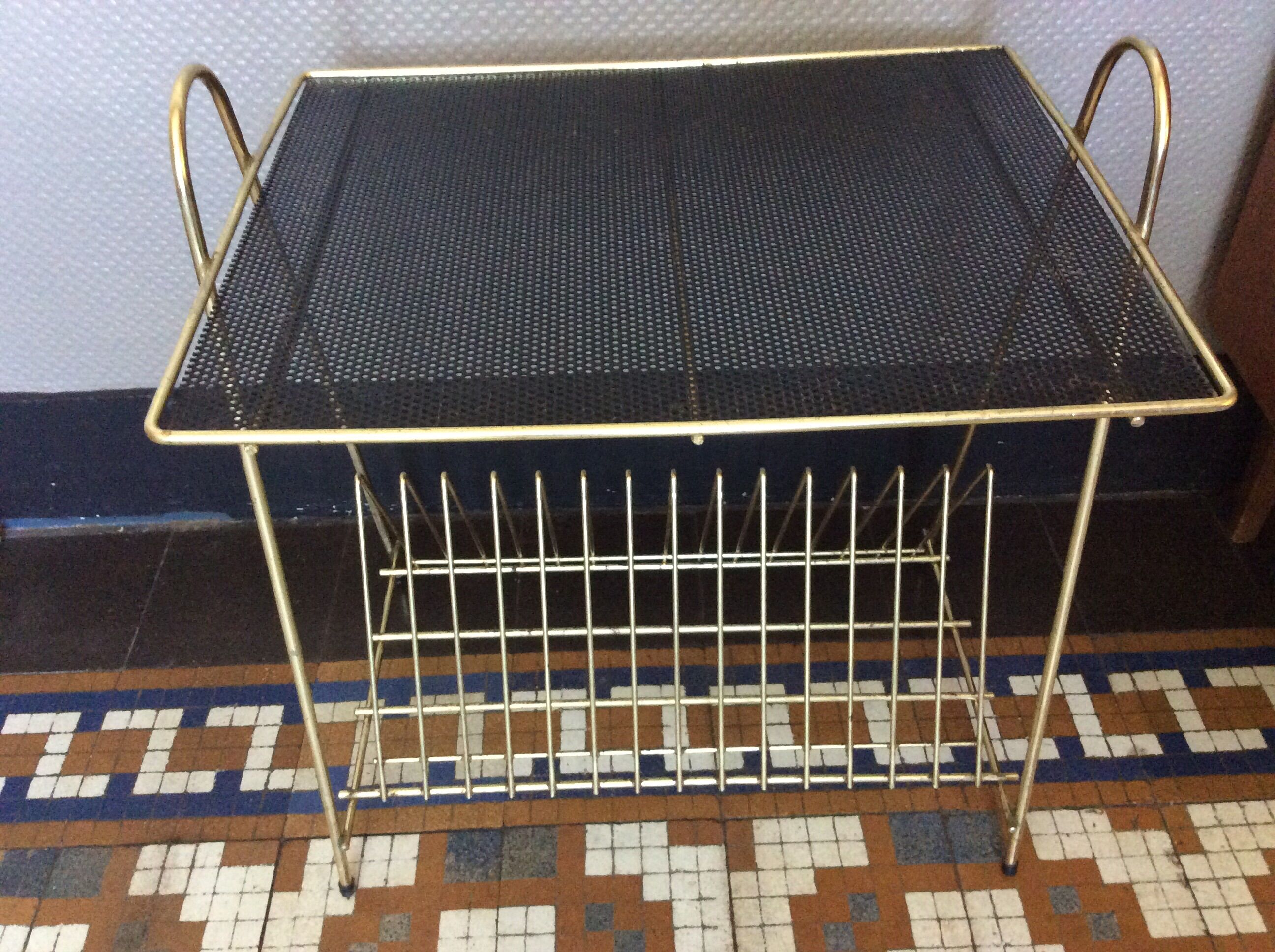 Side table wearing vinyl or journals