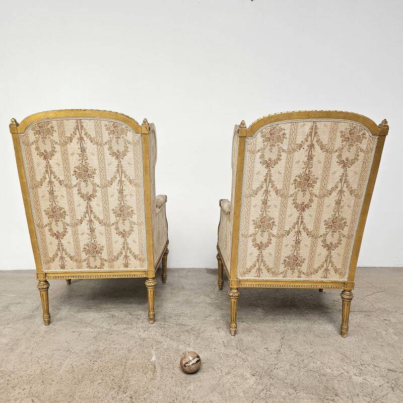 Pair of Louis 16 gilded wing chairs