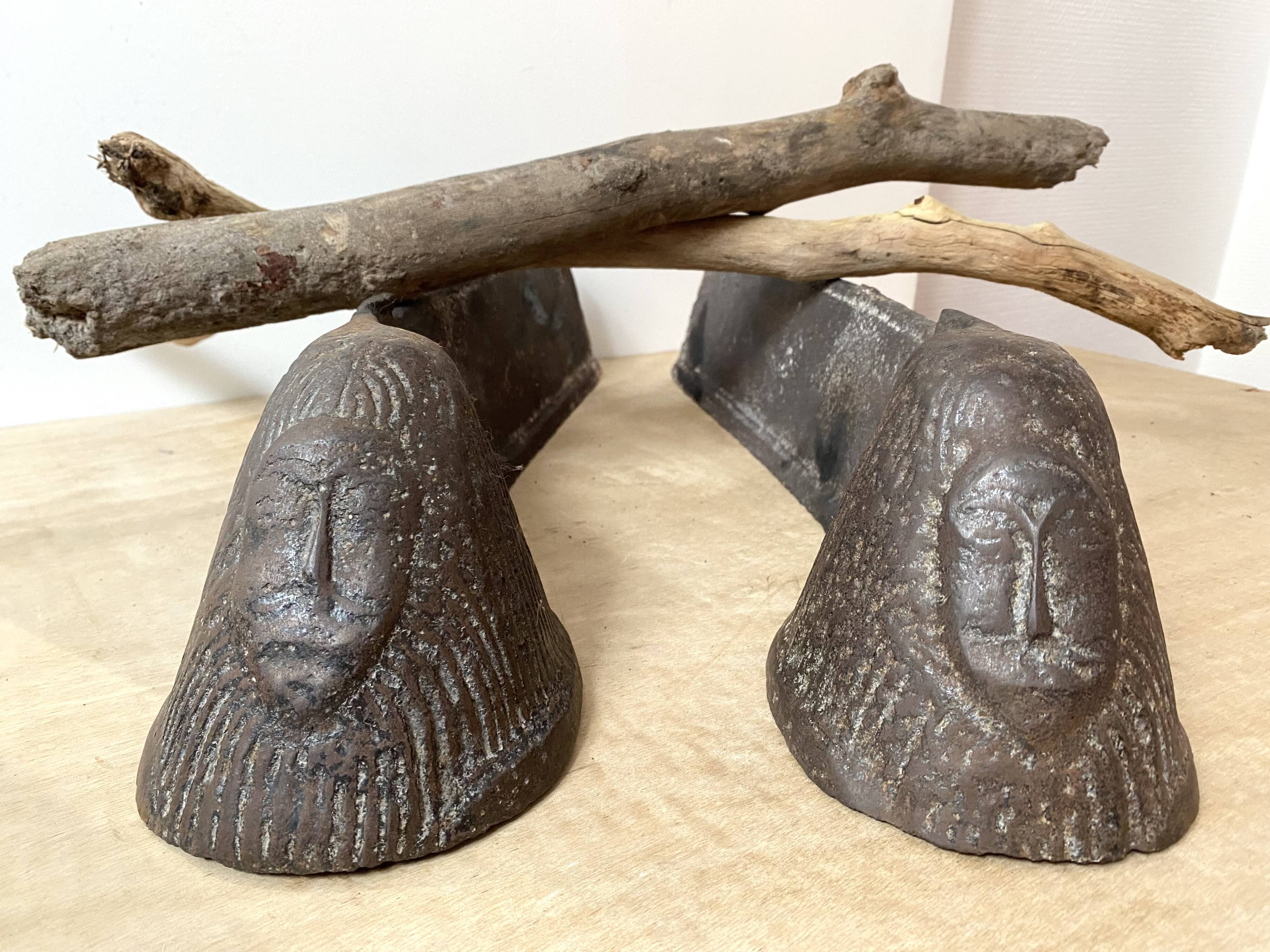 Pair of modernist anthropomorphic fireplace andirons, brutalist log holders 1950s