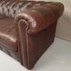 Three seater brown leather chesterfield sofa