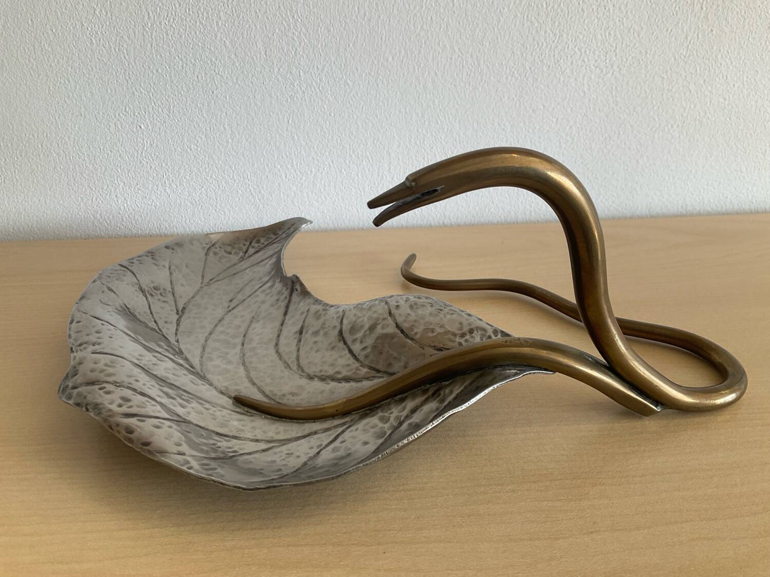 Art Nouveau brass and silver-plated metal pocket emptier