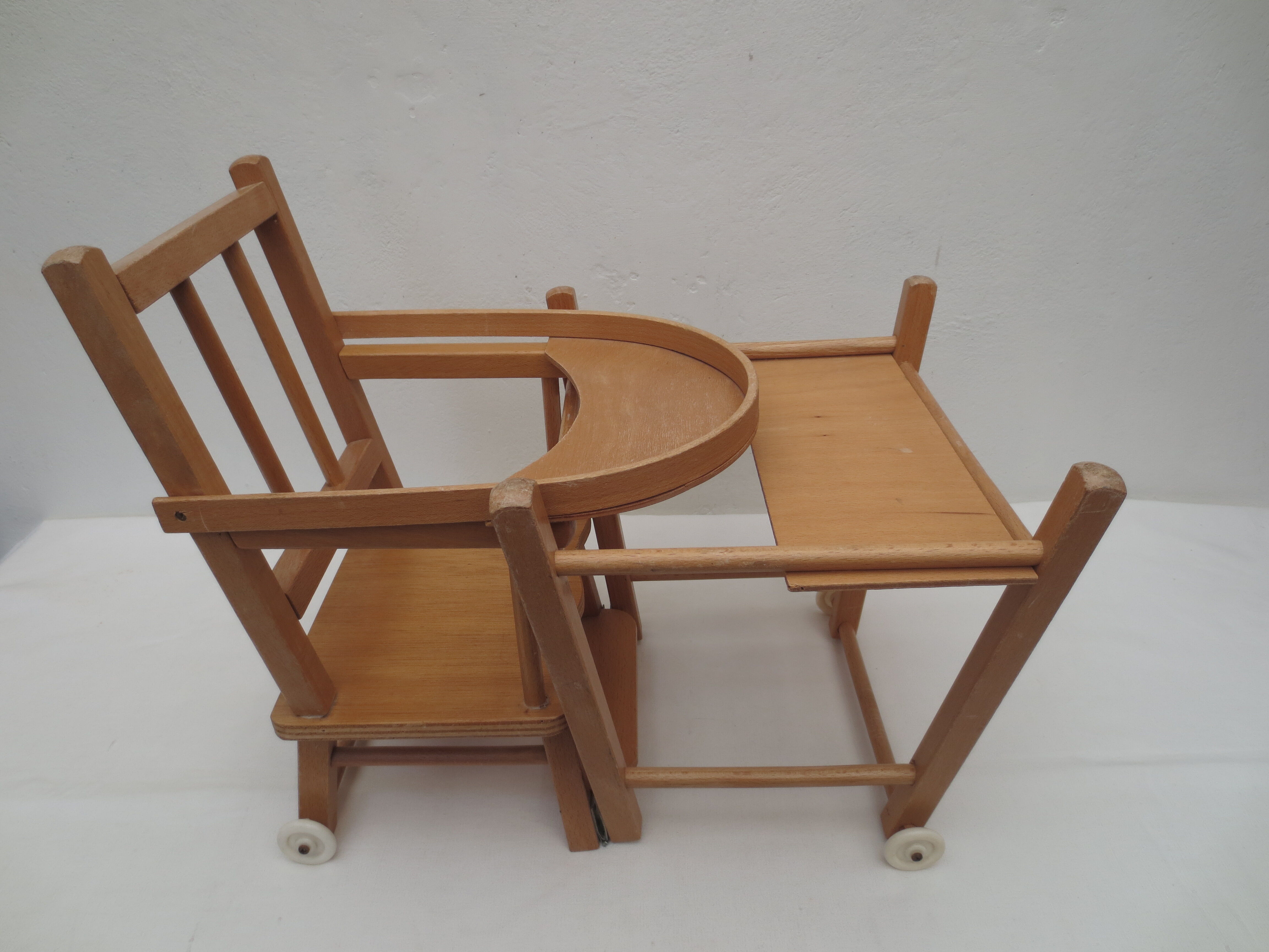 doll high chair with bars, light wood