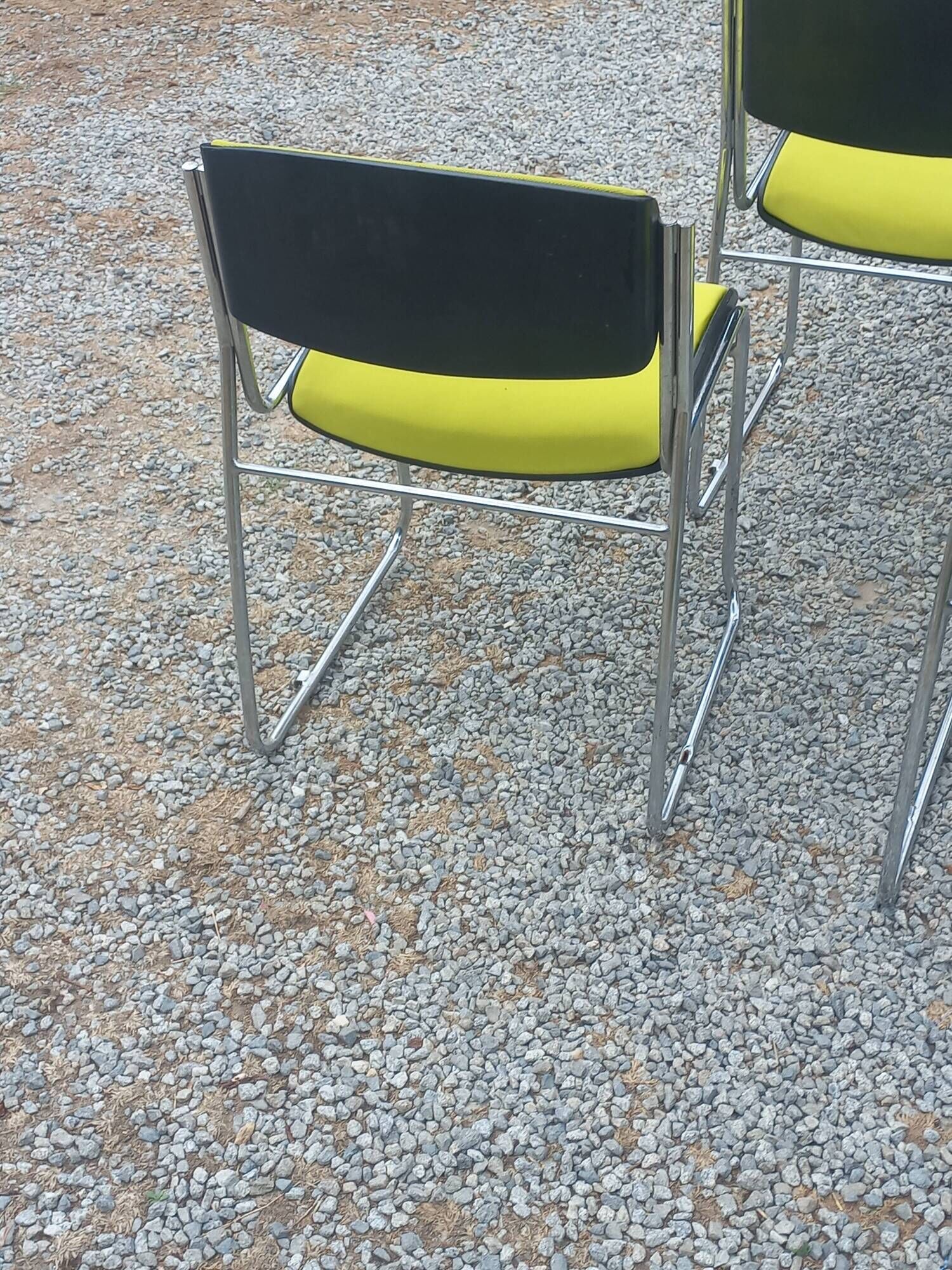 Set of 6 designer chairs with wooden seats and backs, chrome legs.