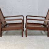 Pair of large armchairs. Wood and cane. Circa 1960