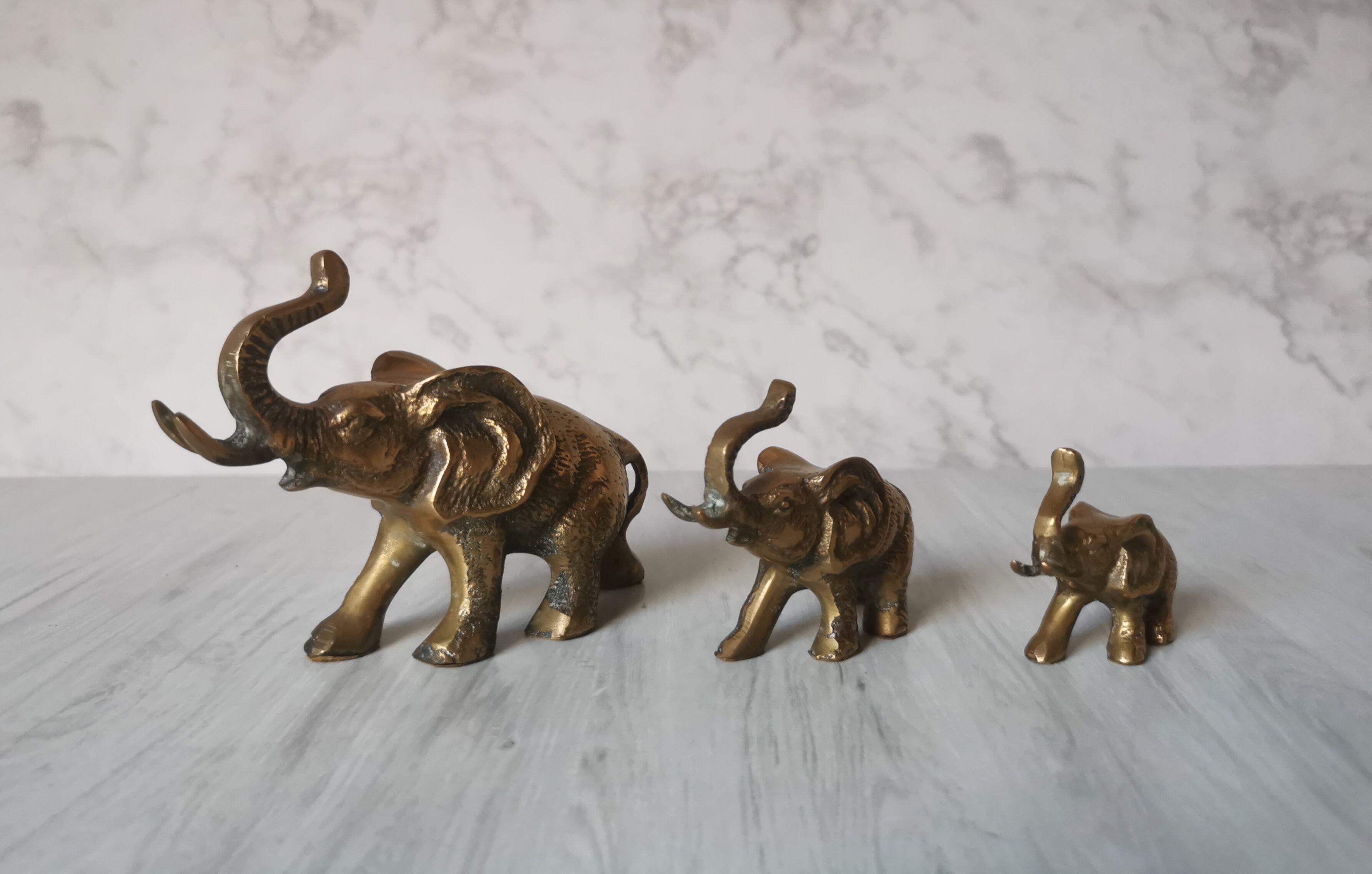Trio of brass elephants