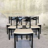 Set of six black lacquered wooden chairs.