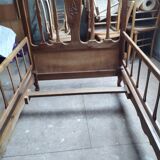 Children's bed with walnut bars