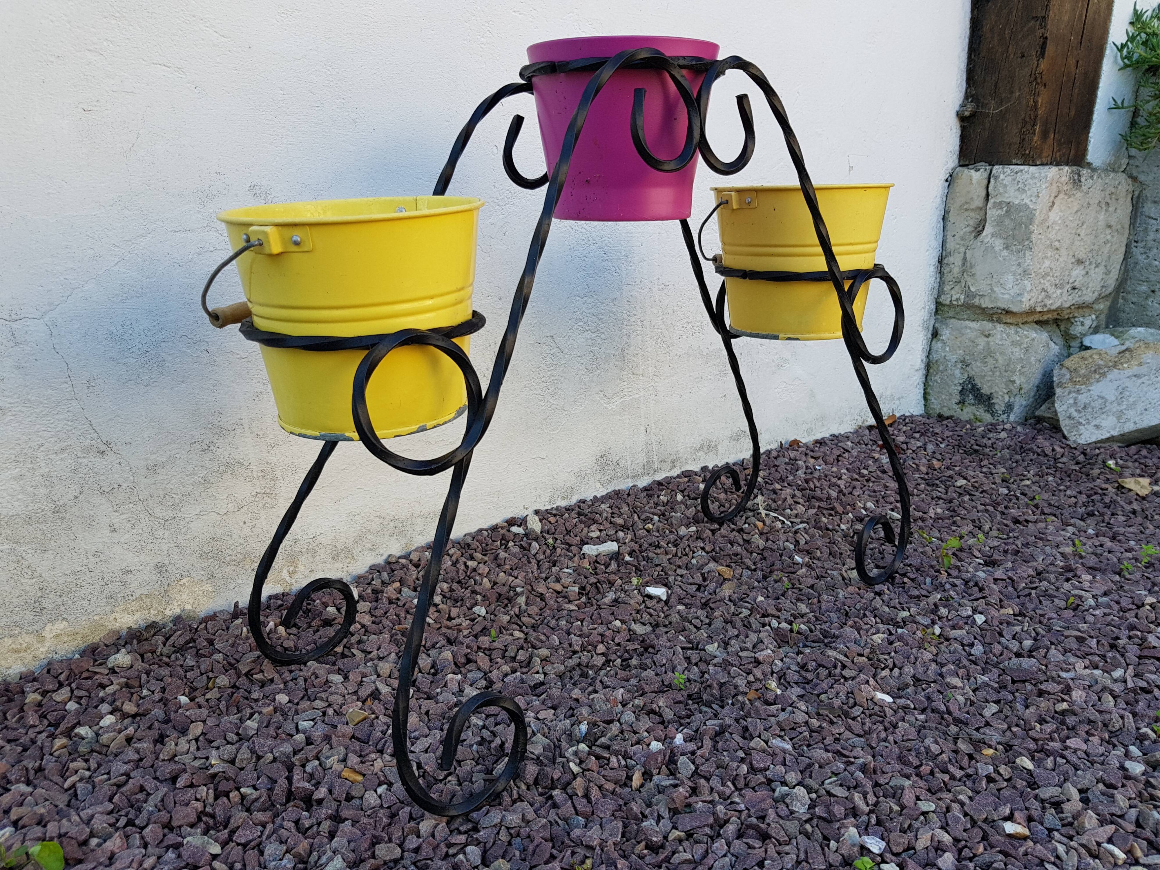 Black wrought iron plant holder