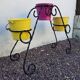 Black wrought iron plant holder
