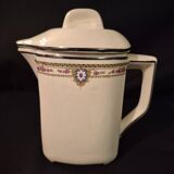 Old covered jug, vintage, geometric frieze with flowers and black trim.