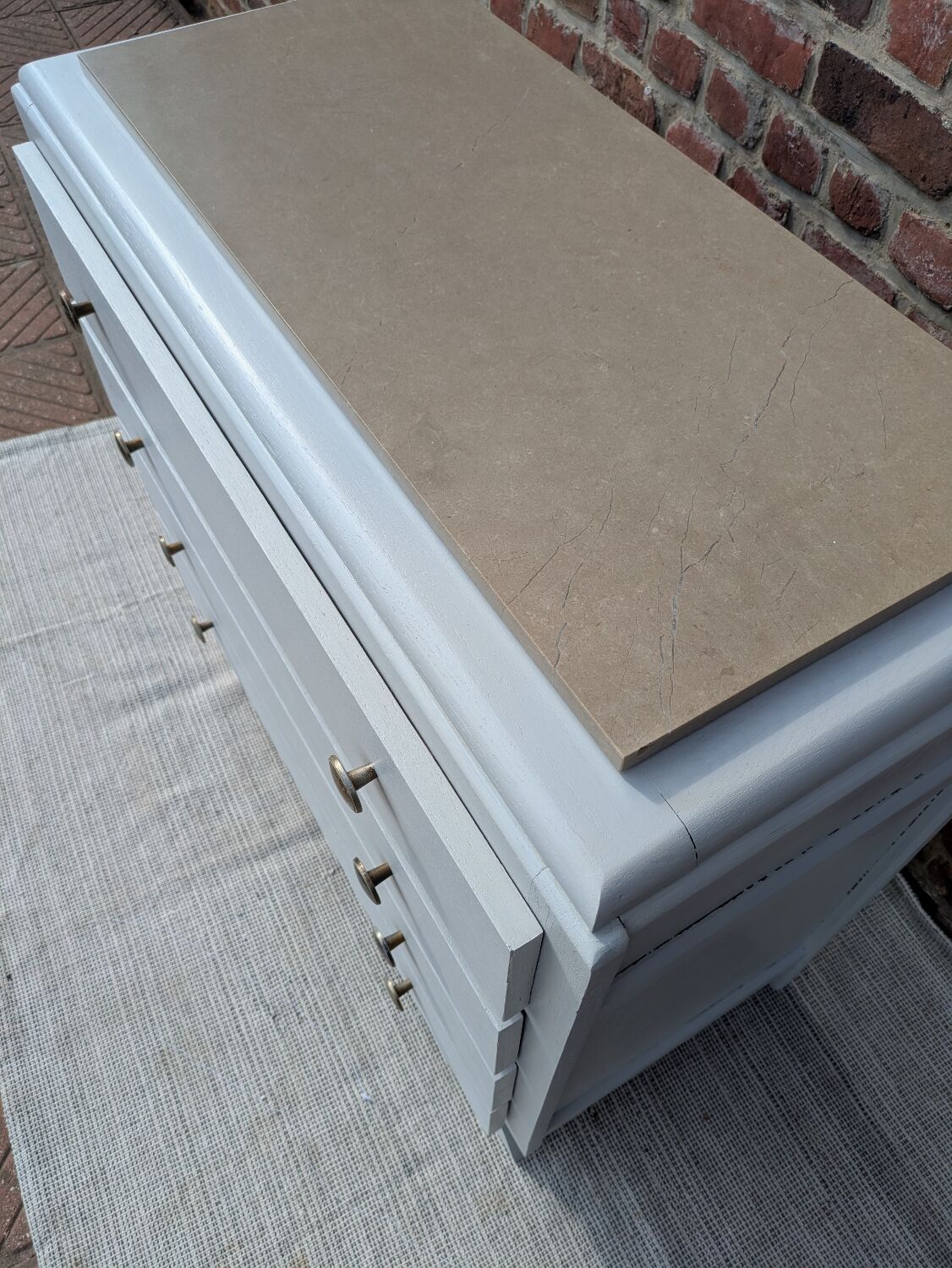 Marble-topped chest of drawers