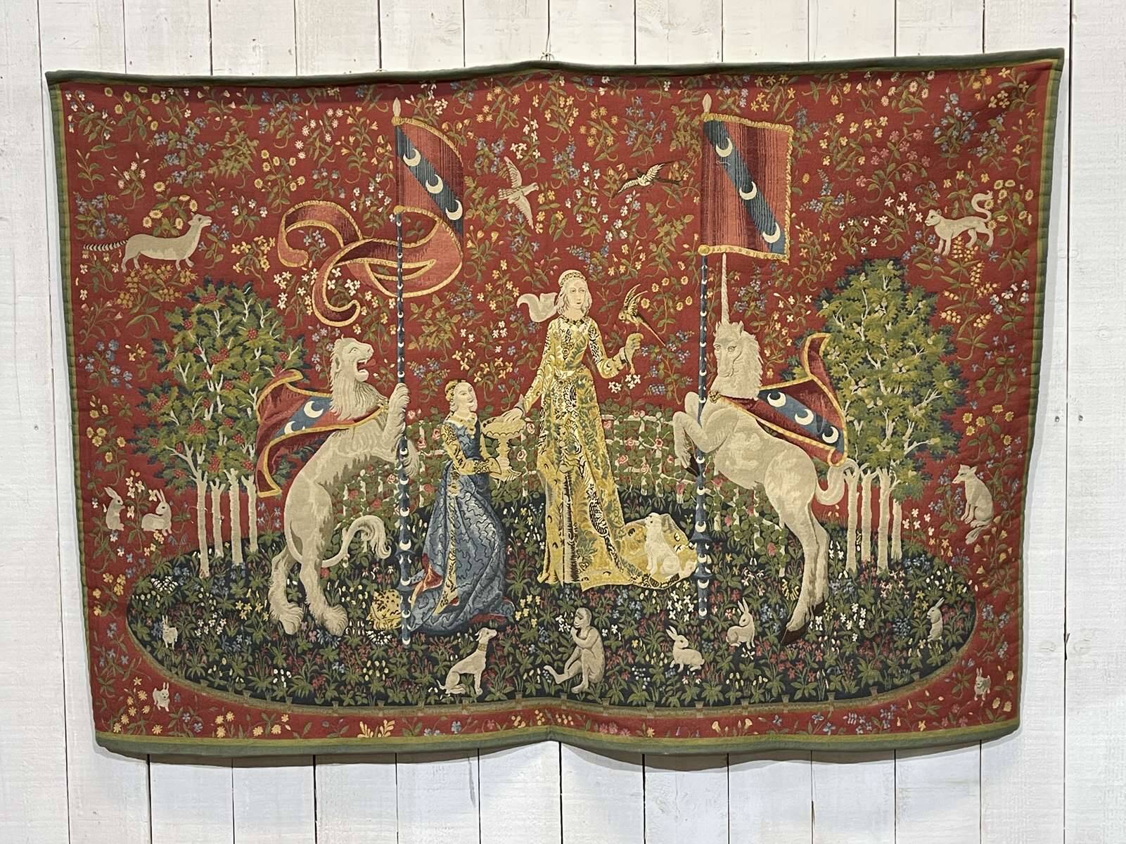 Medieval-style handmade tapestry, named Lady with the Unicorn.