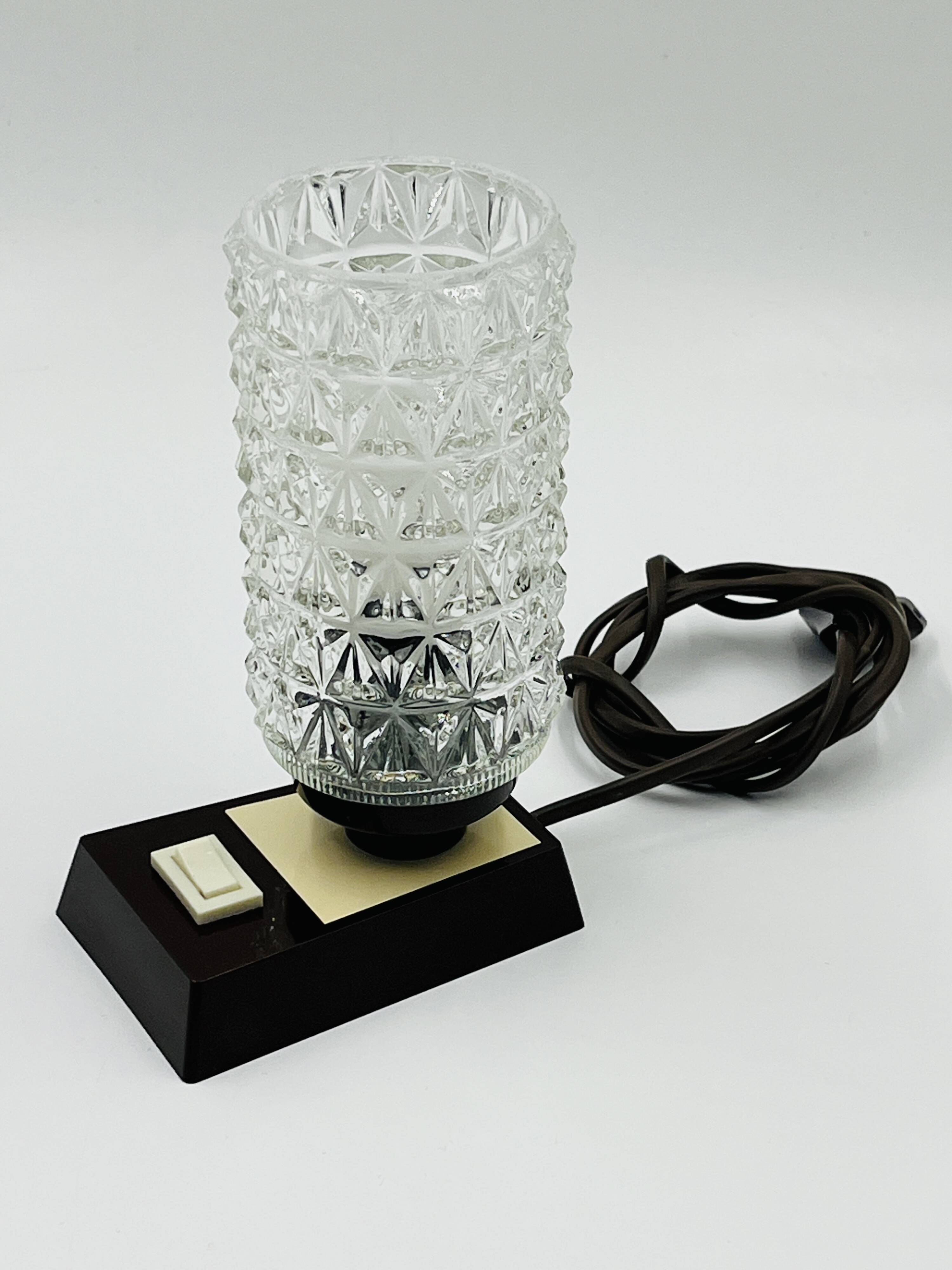Massive bedside lamp in cut glass