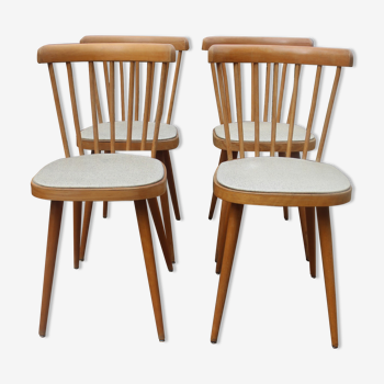 Série de 4 chaises à barreaux