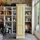 Standing man, cabinet with 1 door, 3 shelves in beige wood