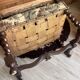 Antique armchair in Henri II style with masks