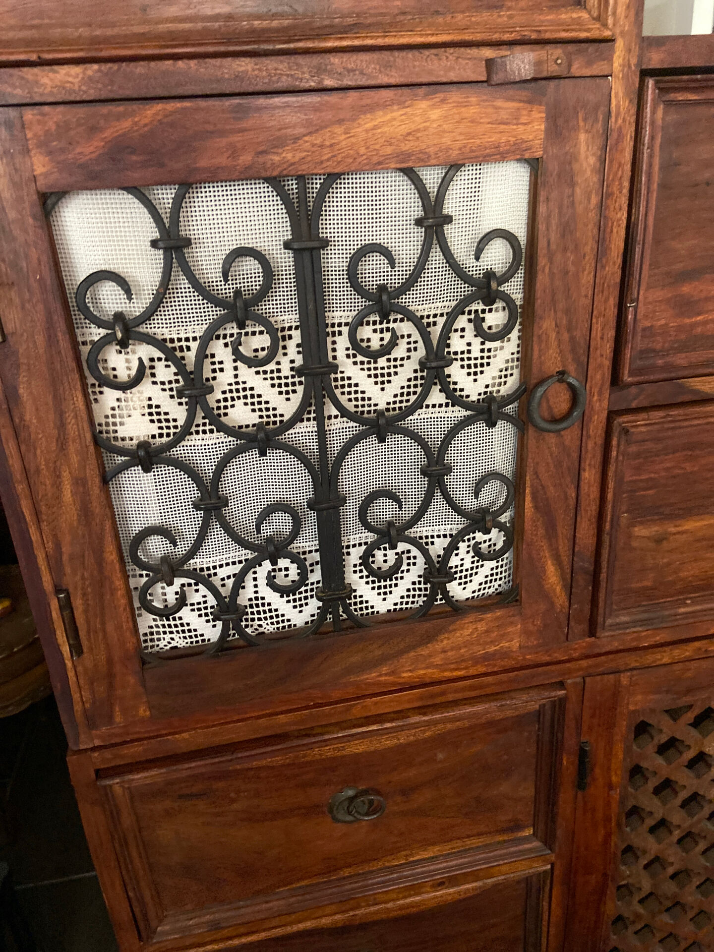 Indonesian staircase furniture in rosewood and wrought iron.