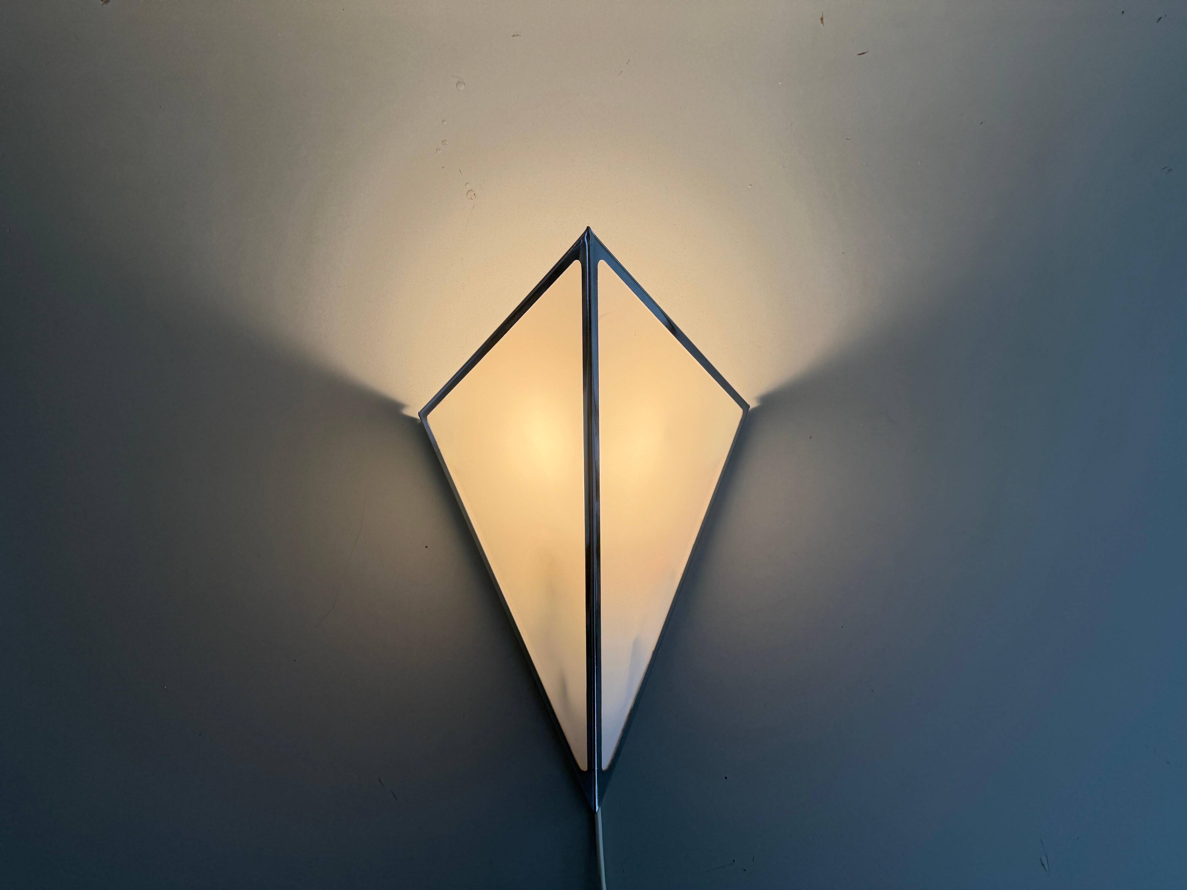 Simple opal glass wall light with an aluminium body, 1980s, Germany.