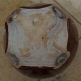Old earthenware cachepot with flower decoration