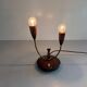 Simple double-headed table lamp in wood and brass, 1960s, Germany.