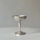 Silver-plated metal stand.