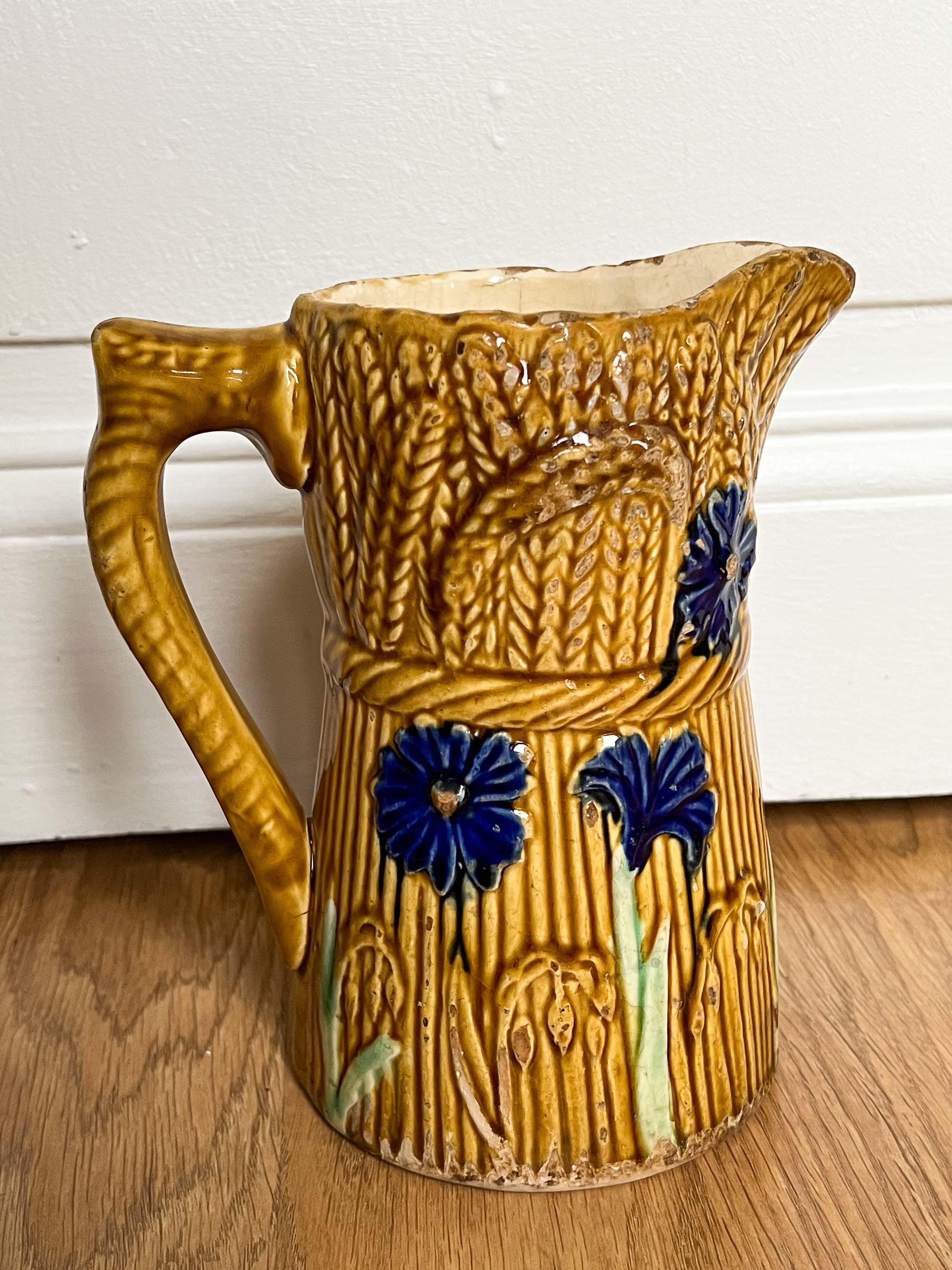 Decorative water decanter in painted ceramic