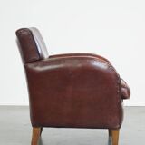 Subtle sheep leather armchair with a beautiful finish and a good patina