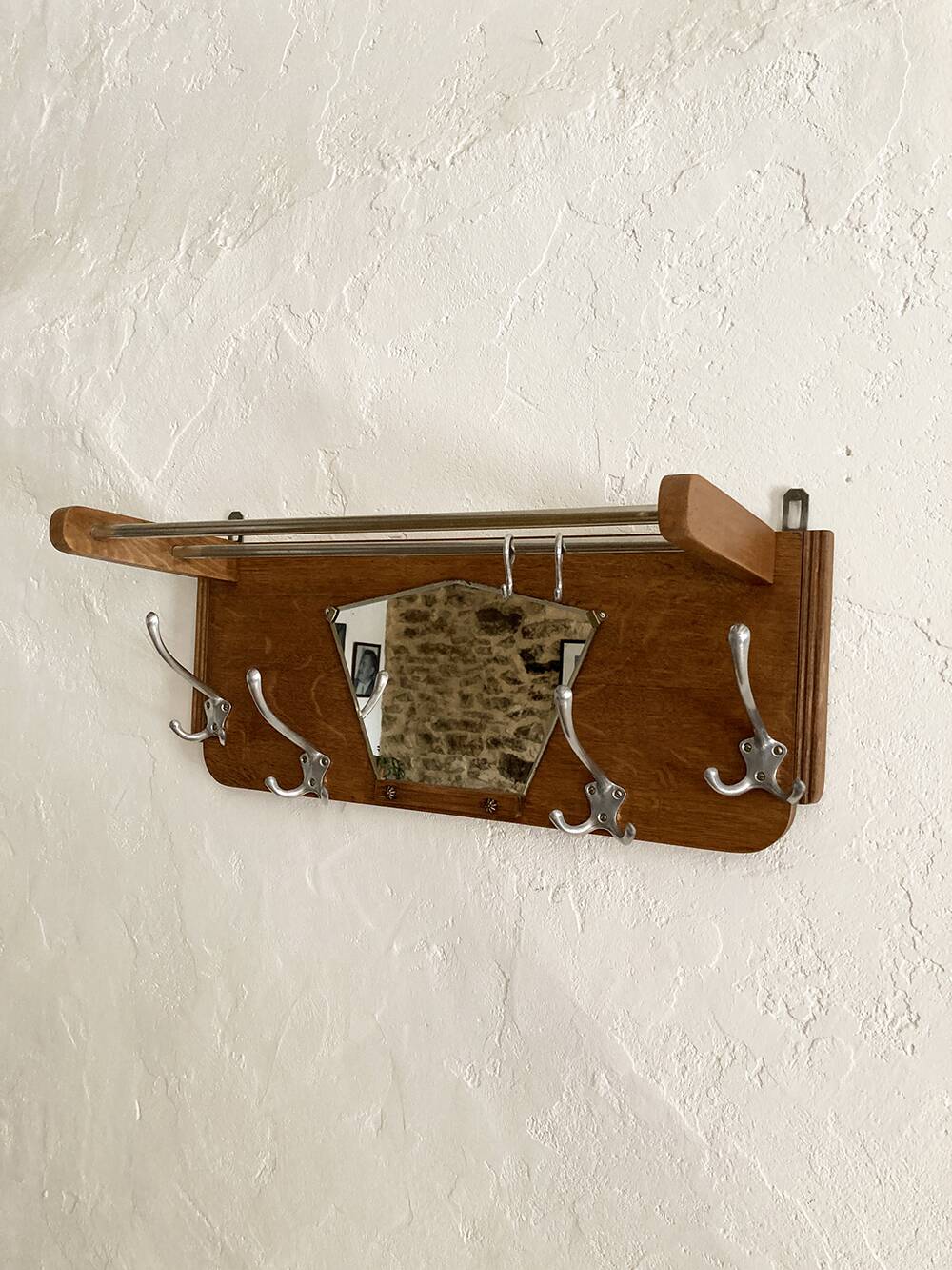 Wall-mounted wardrobe with 4 hooks in wood and aluminum with beveled trapezoid mirror