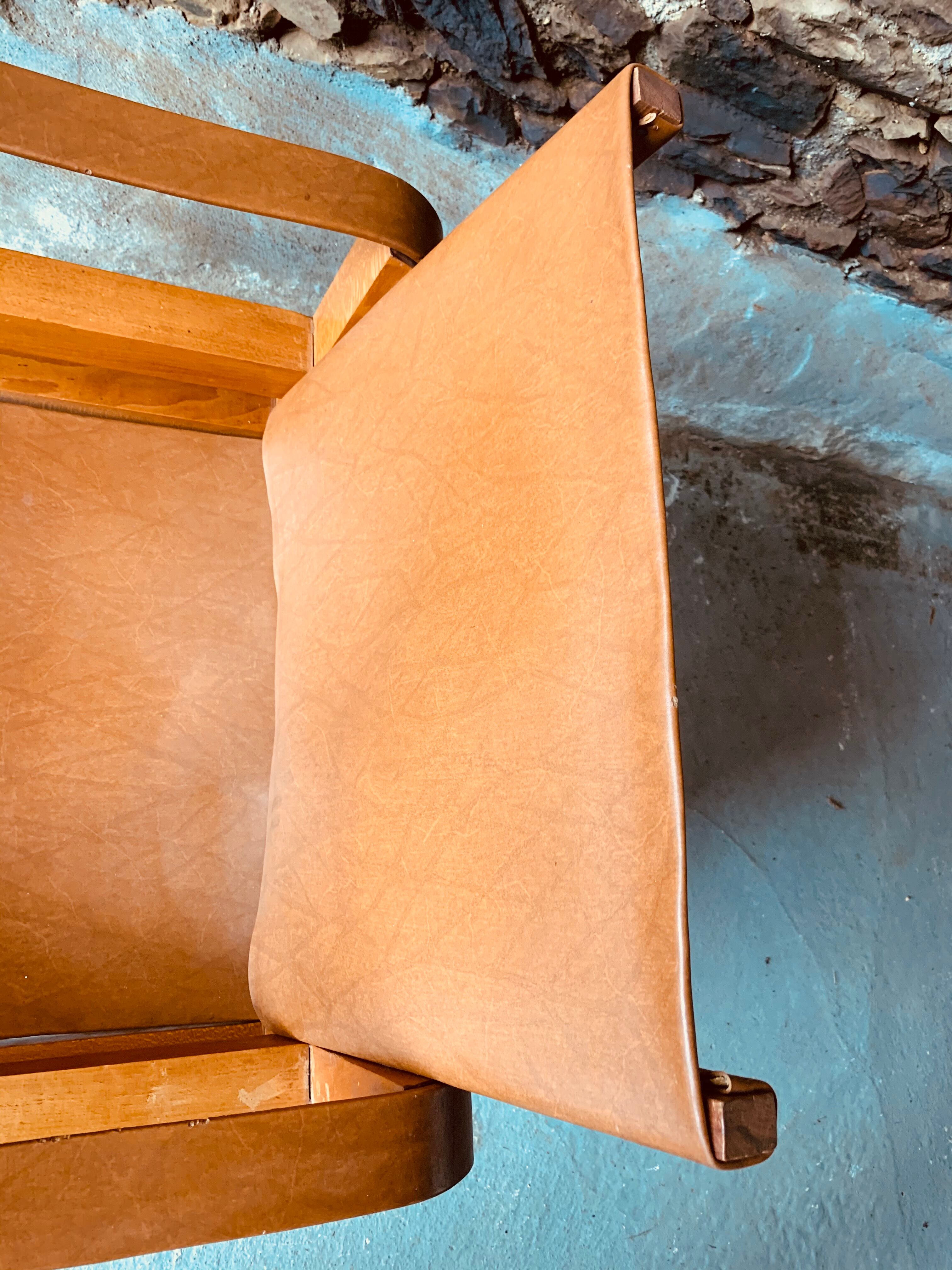 Safari armchair in wood and leather -1950's