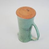 Large green ceramic pitcher with leopard enamel