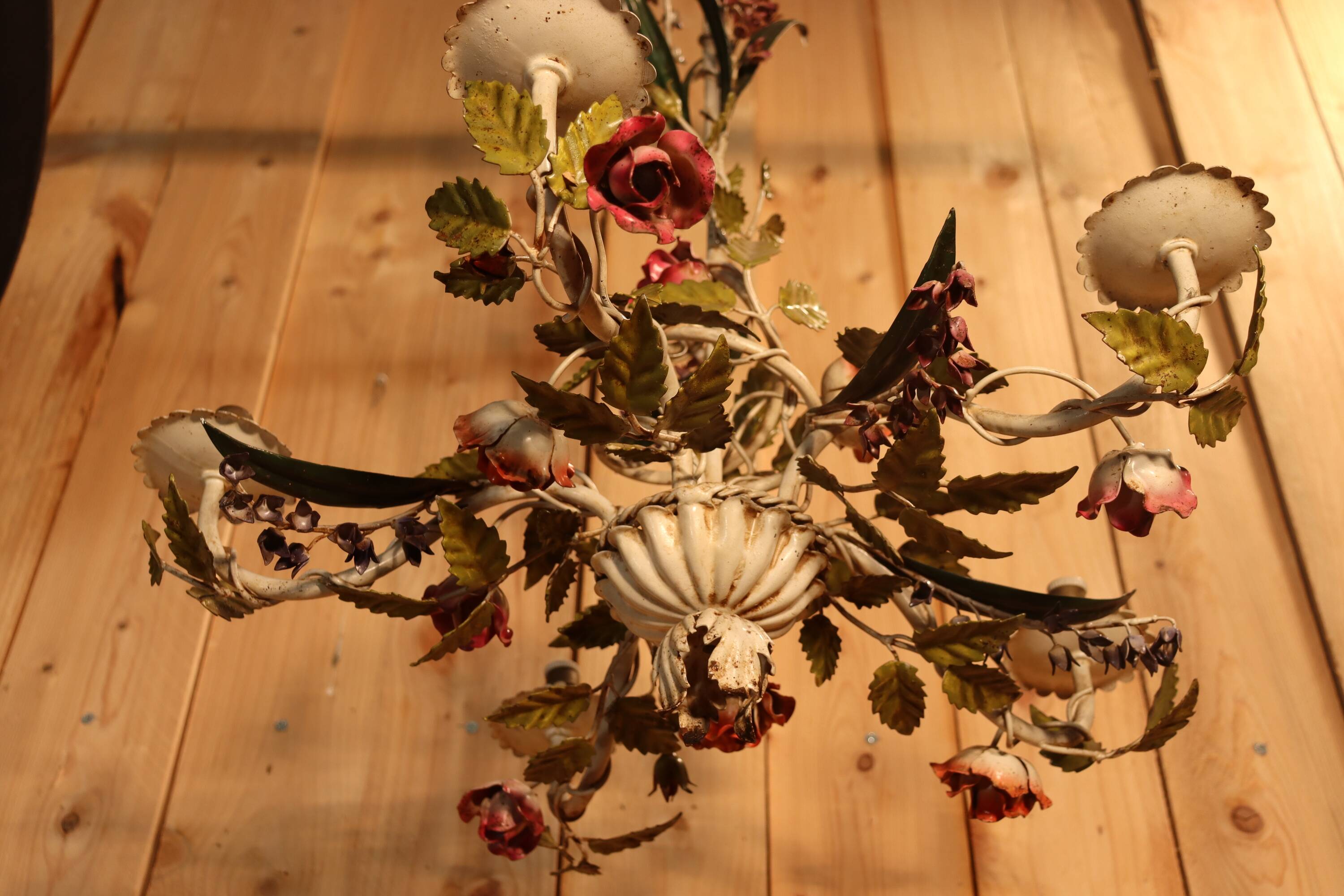 Antique iron chandelier with Art Nouveau floral decoration