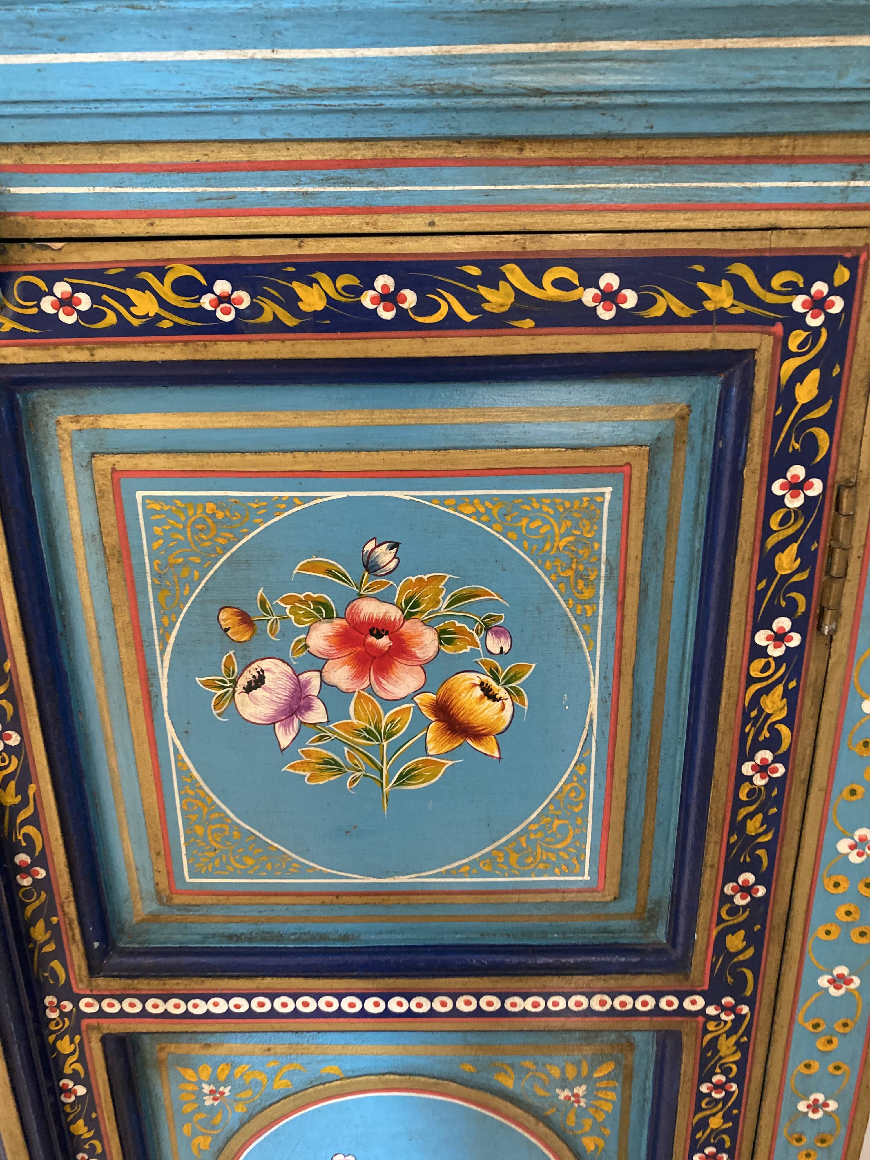 Painted cabinet with floral decoration