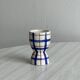 Ceramic egg cup, blue and beige checkered pattern