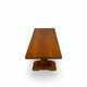 A small, rustic walnut wooden table, crafted from solid walnut wood, 1