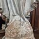 Garden statue of the Virgin Mary in old reconstituted stone