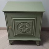 Bedside table with floral sculptures
