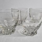 Set of four Art Deco style engraved crystal glasses on spherical feet