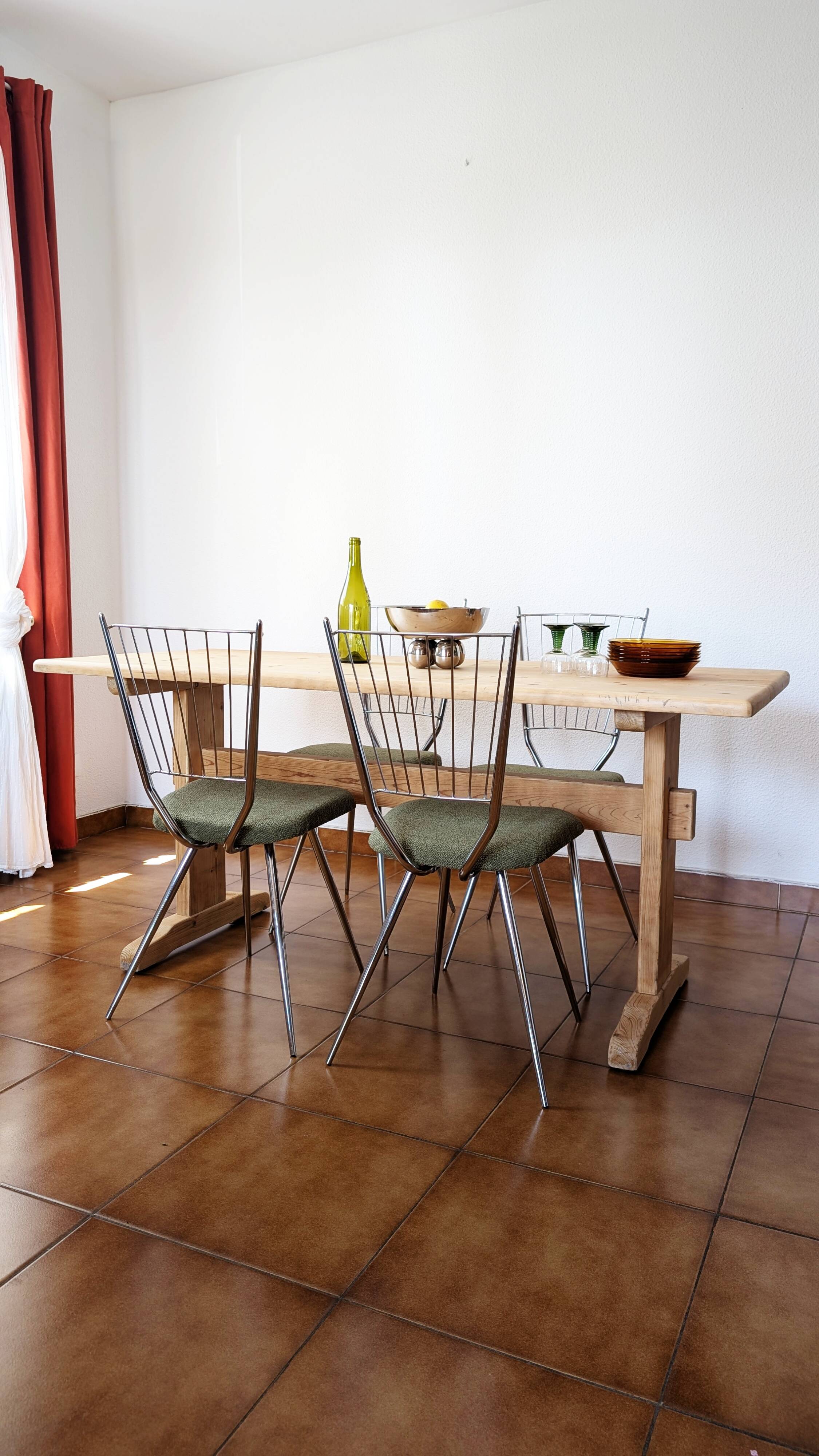 Set of 4 restored vintage chrome chairs.