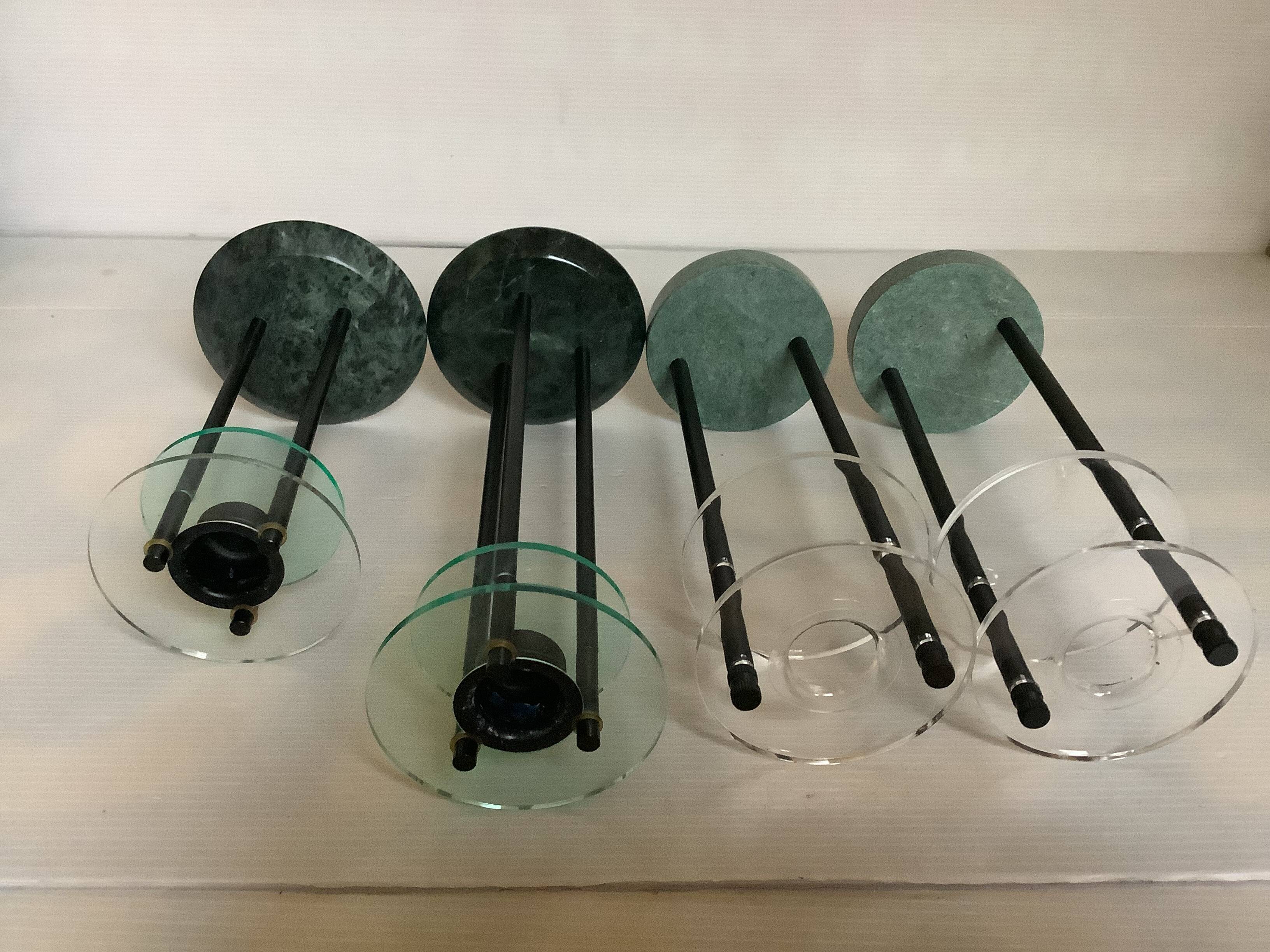 Four postmodernist green marble candlesticks