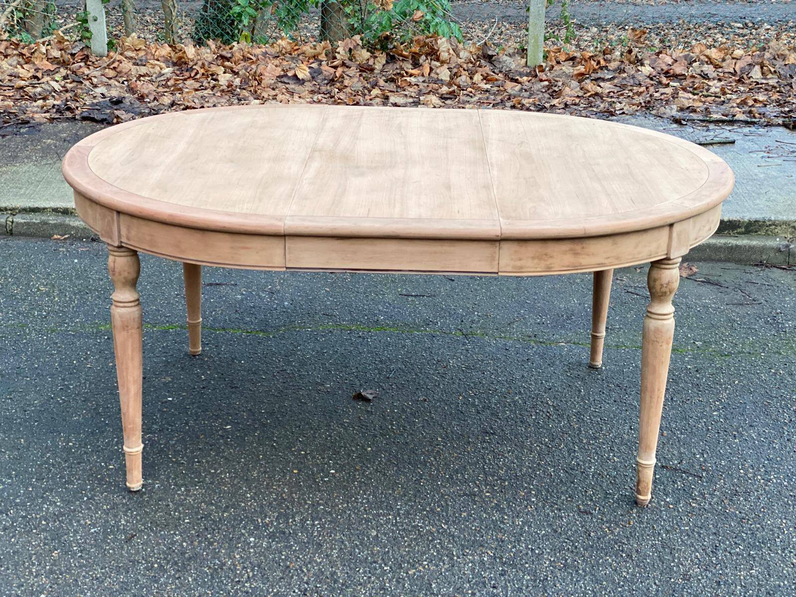 Renovated Louis Philippe round extendable dining table from the 19th century, 210cm.