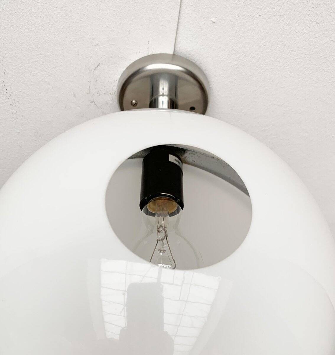 Mid-century Italian space age spherical wall light by Guzzini.