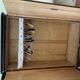 Brown Art Deco wardrobe in curved wood, symmetrical veneer, circa 1930, large size.
