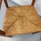 Suite de 2 fauteuils brutalistes vintage en bois de chêne et paille