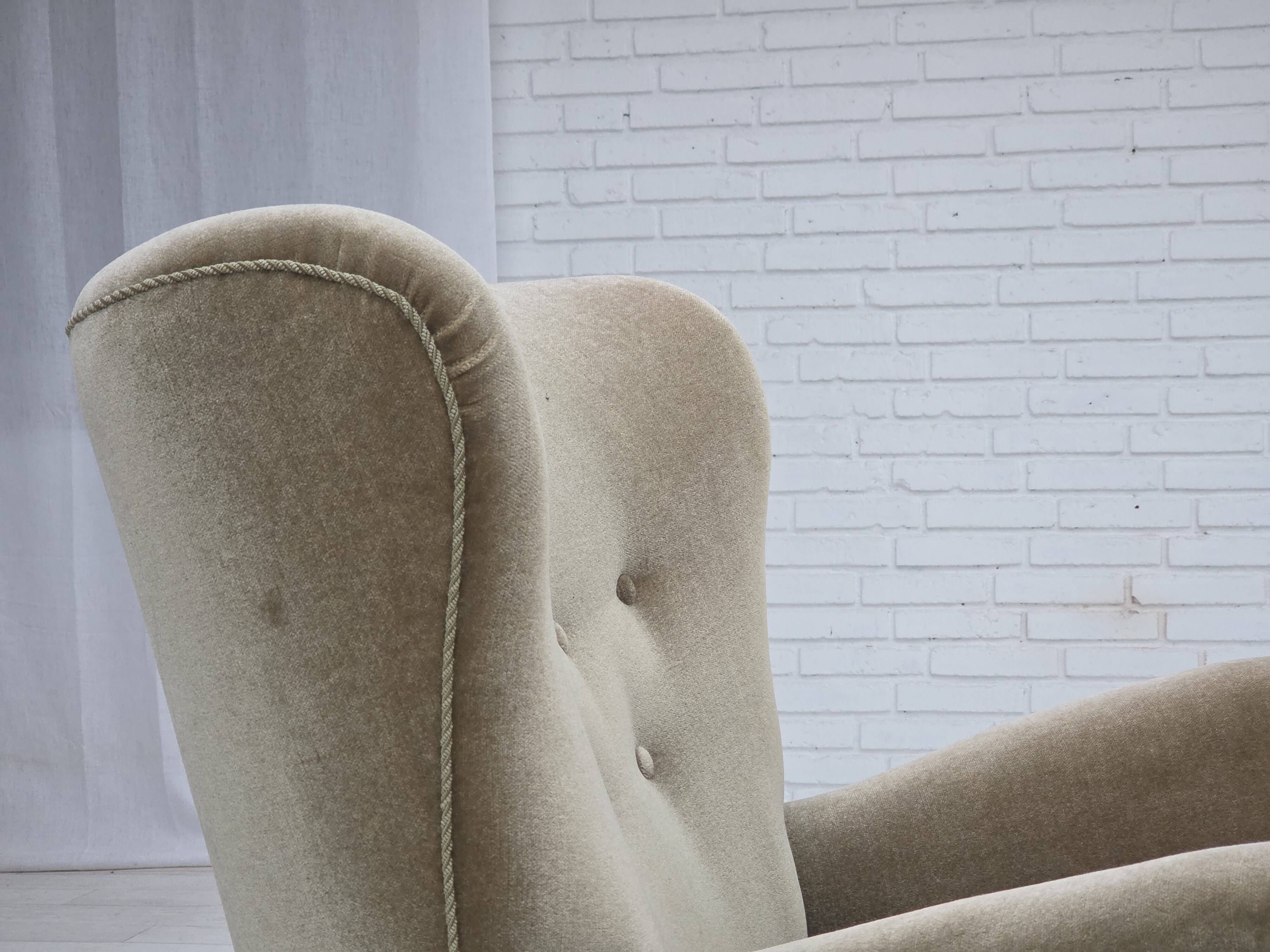 1960s, Danish armchair, green furniture velour, oak wood legs.