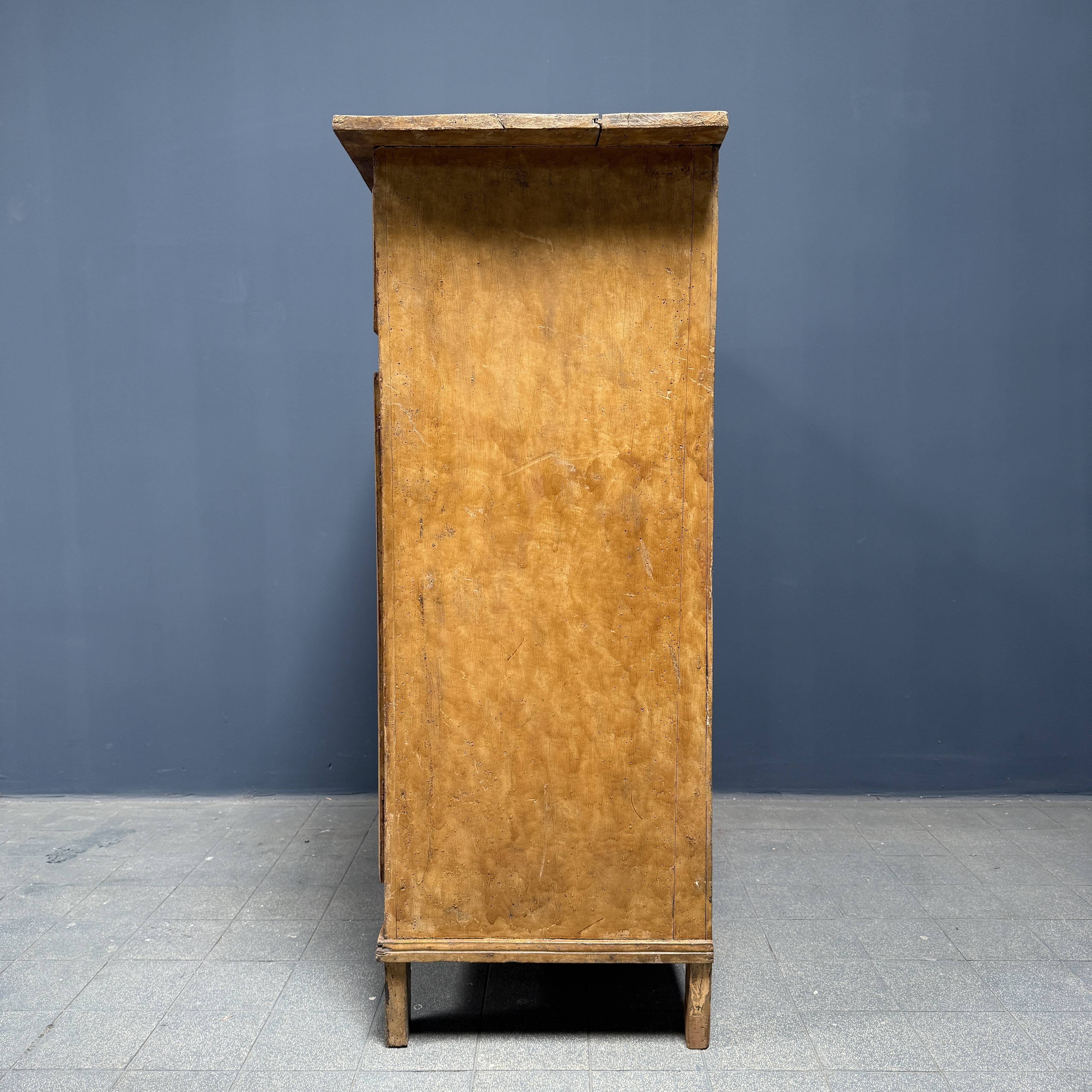 Old marbled ochre yellow French farmhouse cabinet
