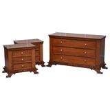 Set of hardwood dressers with finely carved bases.